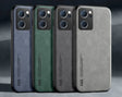 a close up of a group of four different colored cases