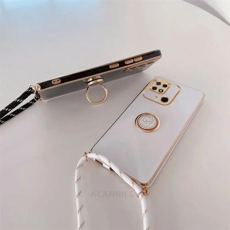 a phone with a gold ring on it