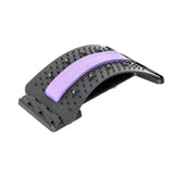 a close up of a purple hair brush with a black handle