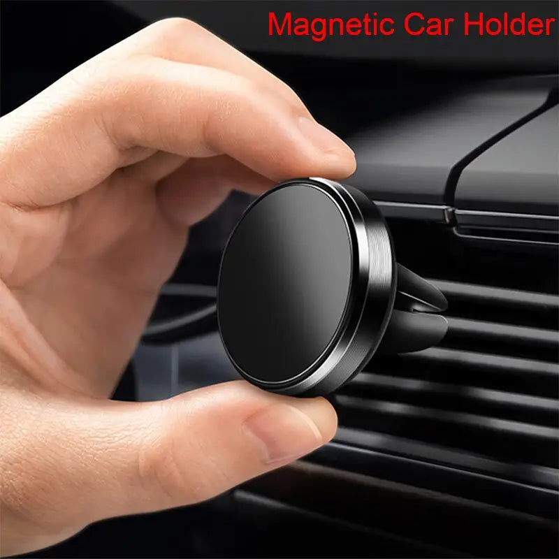 a close up of a person holding a car holder in their hand