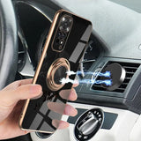 a person holding a phone in their hand while they are using a car air vent vent