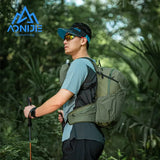 a man wearing a backpack and hiking poles