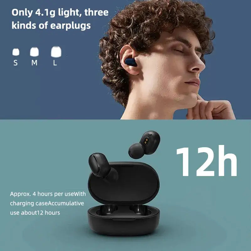 a man with curly hair wearing a pair of bluetooth earphones