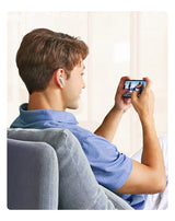 Man playing video game on smartphone.