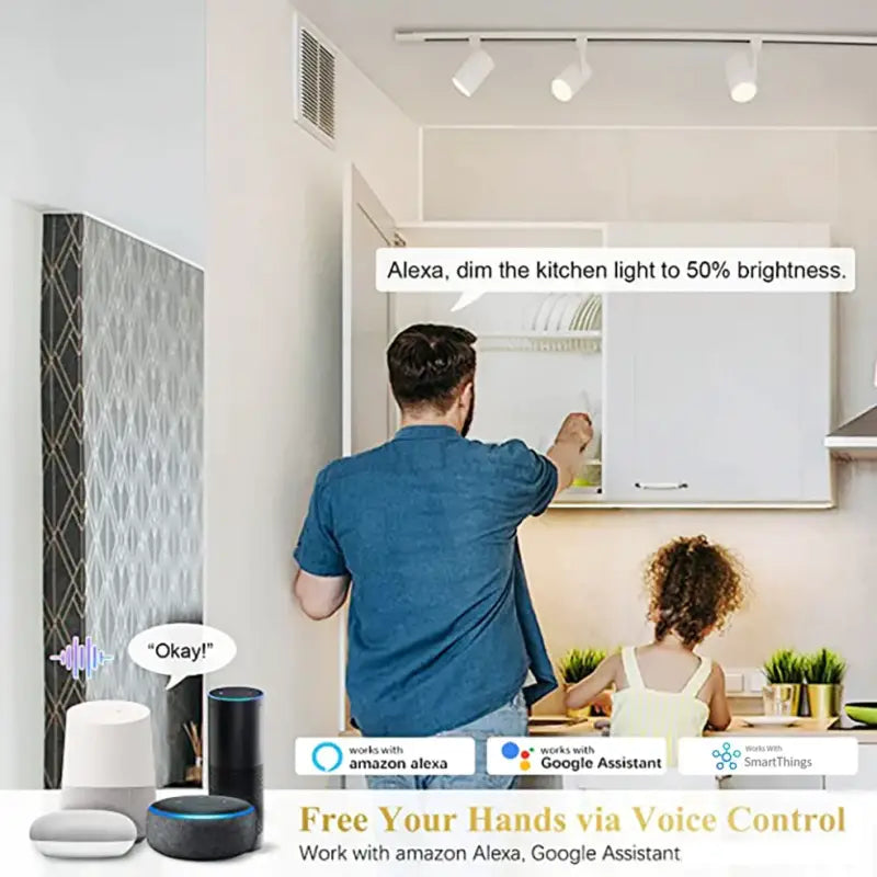 A man and woman in a kitchen setting a smart home automation system