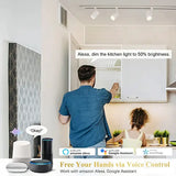 a man and woman in a kitchen setting a smart home automation system