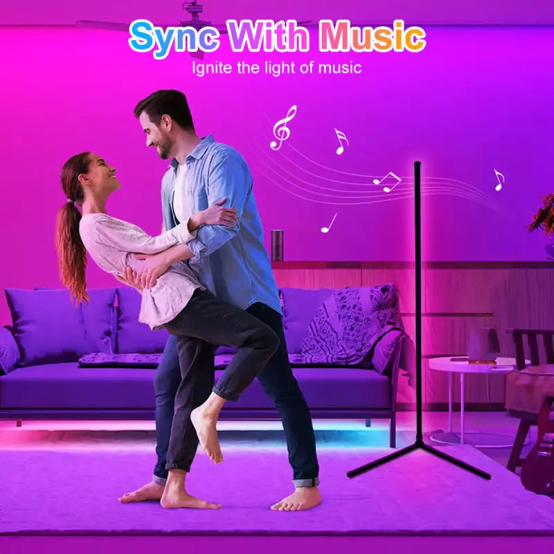 a man and woman dancing in a living room