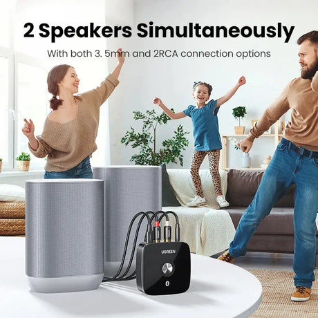 A man and woman dancing in front of a speaker