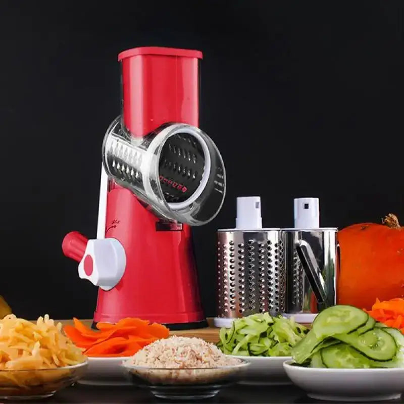 a red juicer sitting on top of a table