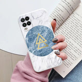 marbled phone case with a triangle and a blue marble