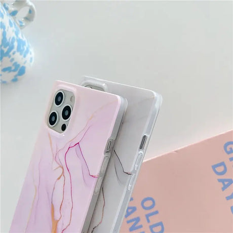 a pink marble phone case with a pink marble pattern