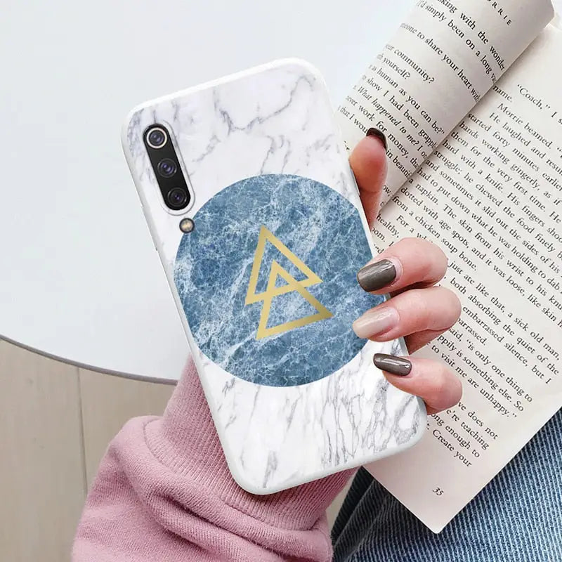 marble phone case with triangle and blue marble