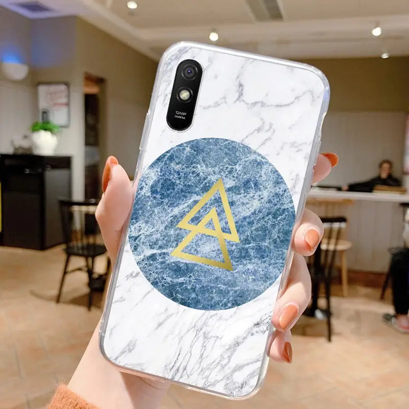 a marble phone case with the letter a on it