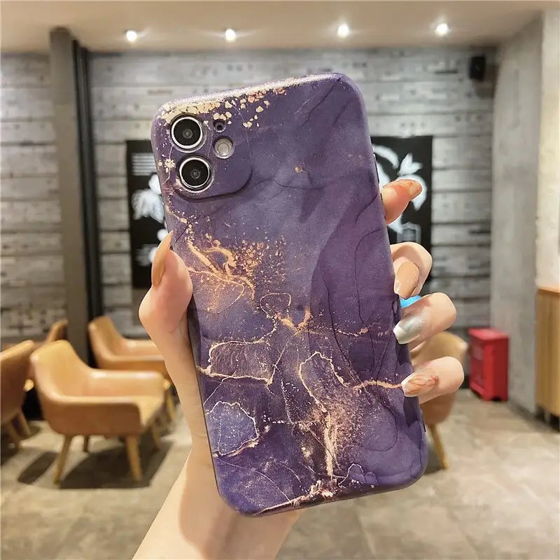 a purple marble phone case with a camera lens