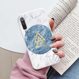 marble phone case with triangle and blue marble