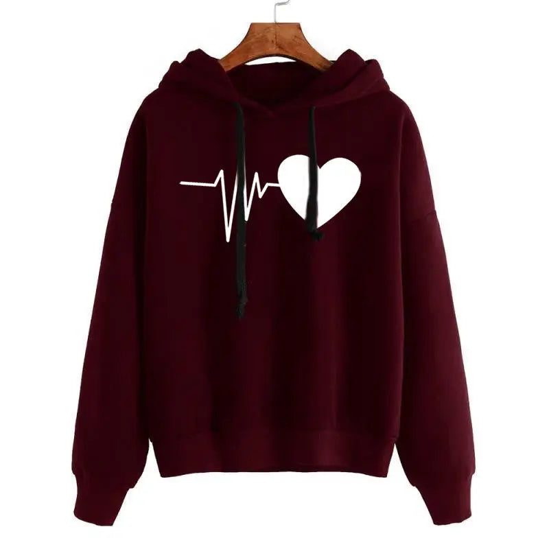 a maroon hoodie with a white heart on it