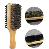a wooden brush with a black br brush head