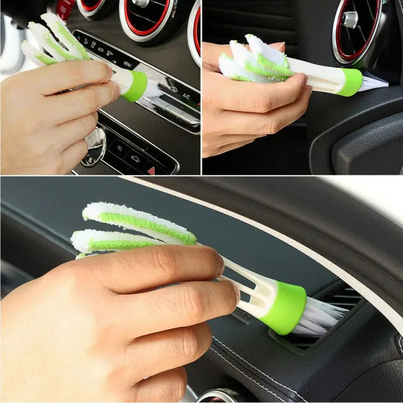 a person cleaning a car with a sponge