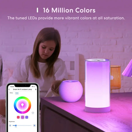 a woman sitting on a table with a smart light