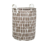 the brown and white geometric pattern on this laundry basket is perfect for a small space