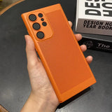 the case is made from a bright orange plastic material