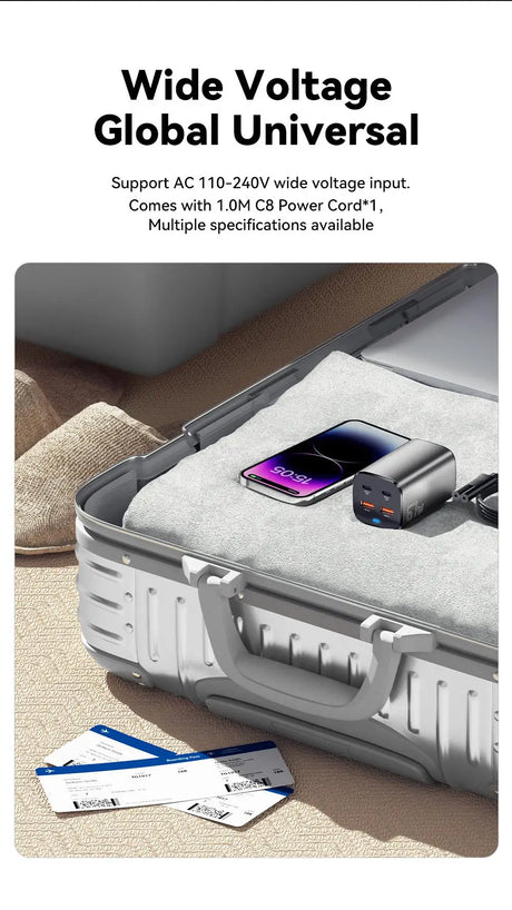 Metallic suitcase or briefcase with a charging device and smartphone on top.