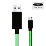 a close up of a usb micro usb cable with a green glow