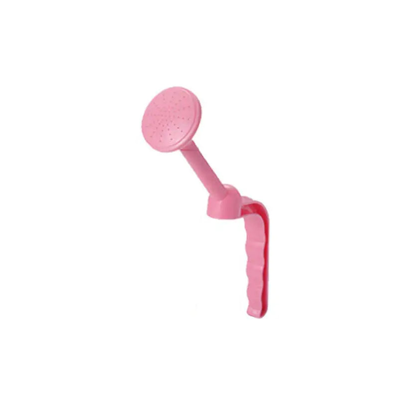 a pink plastic shower brush