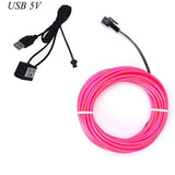 a close up of a pink cord with a usb cable