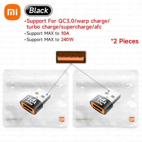 two pieces of orange and black power adapter for the nintendo wii