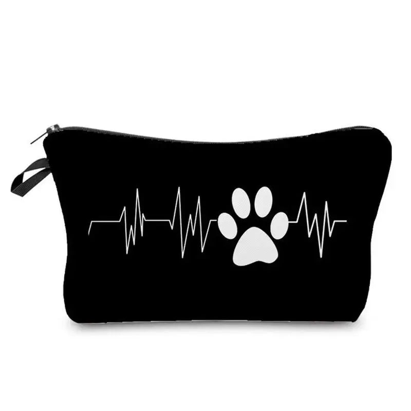 a black zipper bag with a white dog paw heartbeat