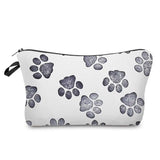 a white and black heart print makeup bag