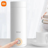 xiao mimi air purifier with a cup of coffee