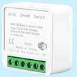 Mini smart switch with WiFi capability and green terminal block connections.