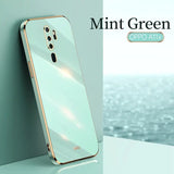 the mint green glass case is shown on a white surface