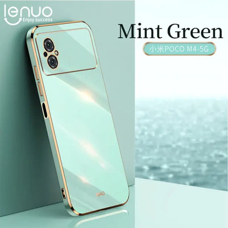 the mint green iphone case is shown on a table