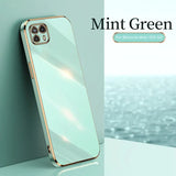 the mint green iphone case is shown on a white surface