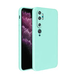 the back of a mint green iphone case