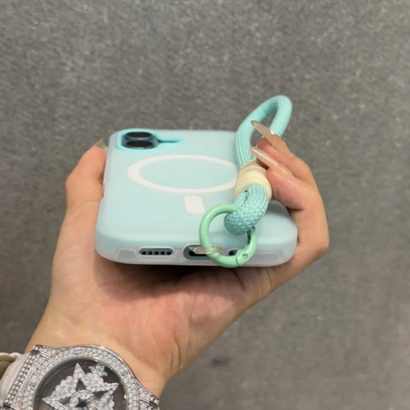 Mint green phone case with a wrist strap.