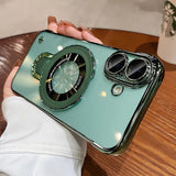 Mint green phone case with ring stand.