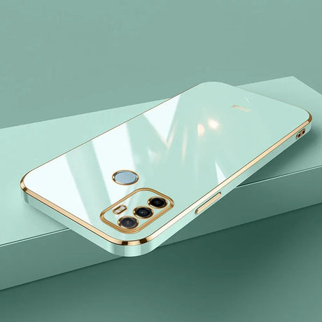 Mint green phone case with gold trim.