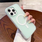 Mint green silicone iPhone case with a white MagSafe ring.
