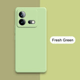 Mint green smartphone with a dual-camera setup.