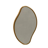 the oval mirror is a gold frame with a black and white background