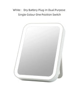 the mirror is white and has a white frame