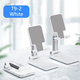 a white table with two white tables and a phone
