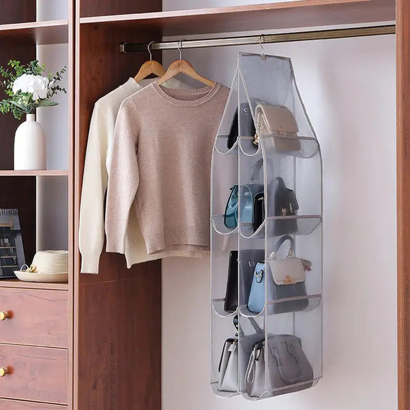a closet with a coat rack and a pair of shoes