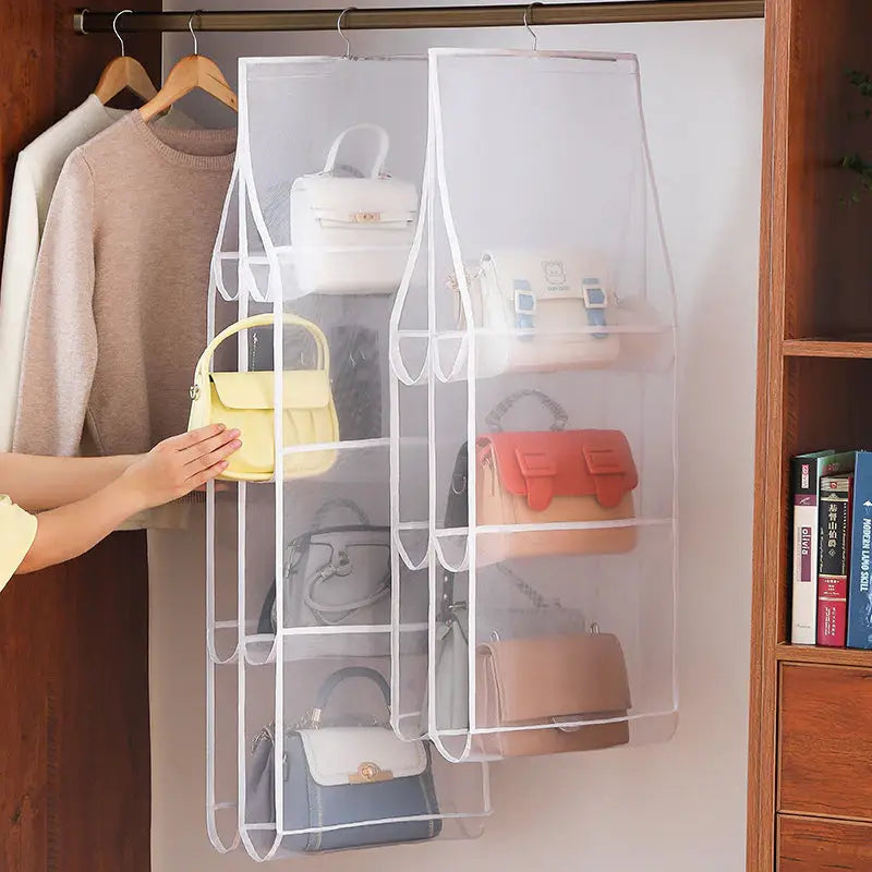 a woman holding a hanging organizer in a closet