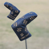 two golf clubs with gold and black symbols on them