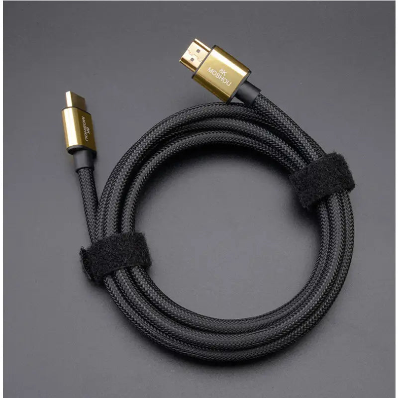 a black and gold braided usb cable